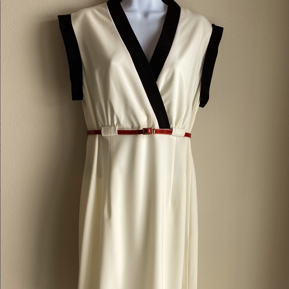 Calvin Klein Dress size 12, cream with black trim and red belt.